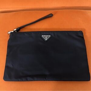 Prada wristlet 😍.